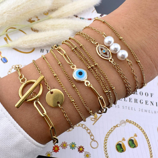 Evil eye gold bracelet stack