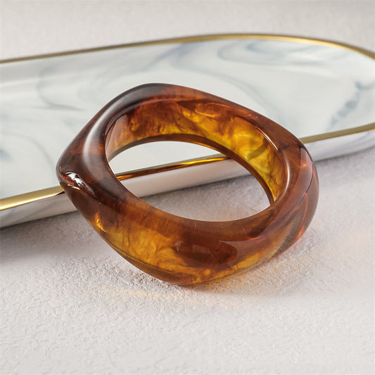 Jayla Acrylic Amber Tiger Eye Bangle